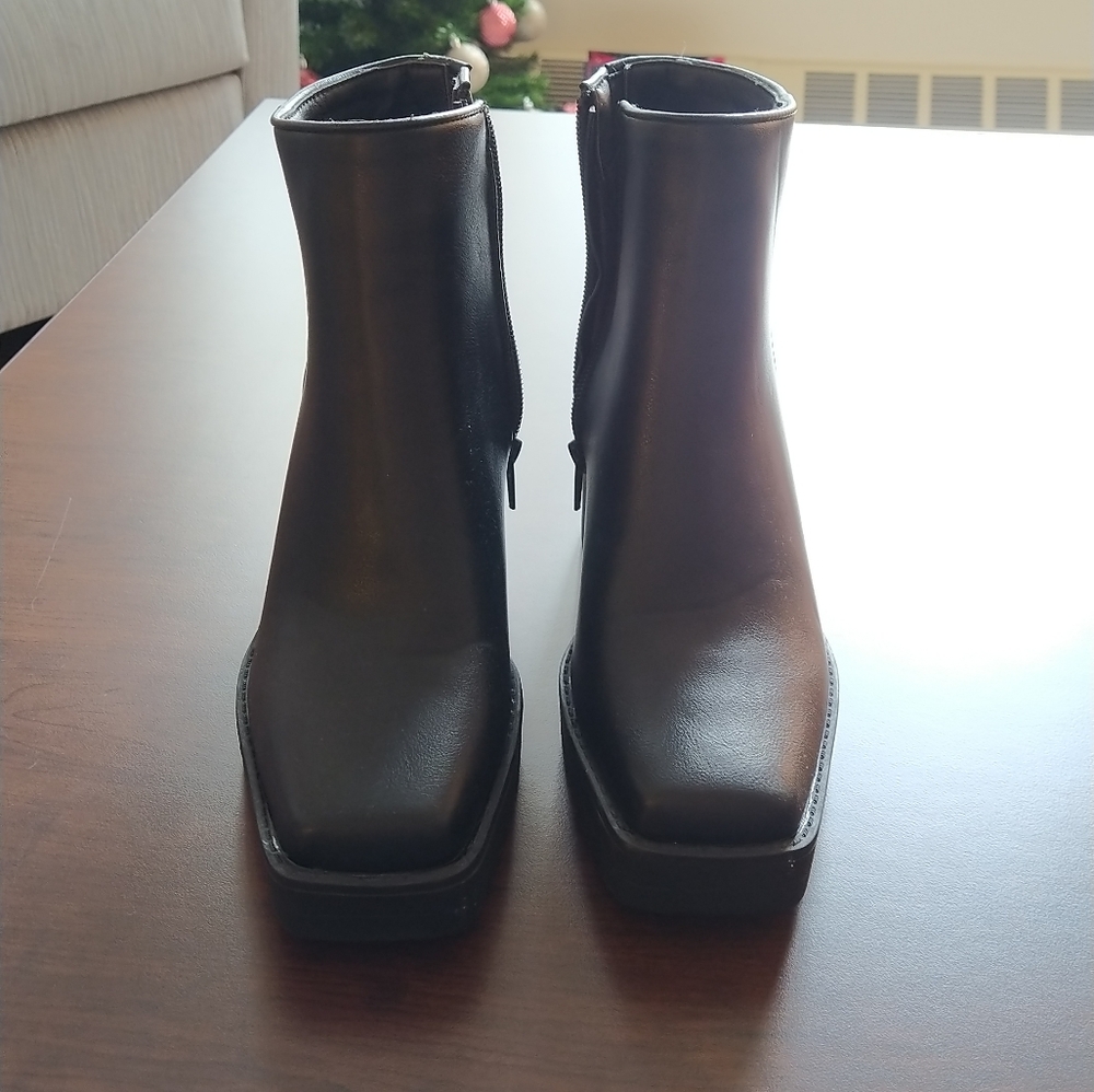 Alex Bootie Lug Sole Black Leather Slip on